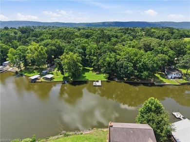 Tucked away along the shoreline of Lake Hamilton in a peaceful - photo 48