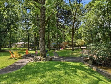 Tucked away along the shoreline of Lake Hamilton in a peaceful - photo 50