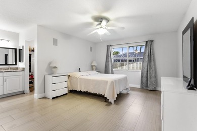 Nestled on a quiet street, this spacious CBS home is designed - photo 11