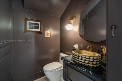 Nestled in the prestigious Ponce-Davis neighborhood, one of - photo 14