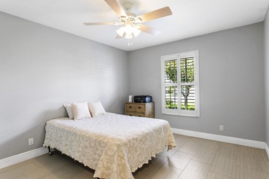 Nestled on a quiet street, this spacious CBS home is designed - photo 14