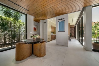 Nestled in the prestigious Ponce-Davis neighborhood, one of - photo 15