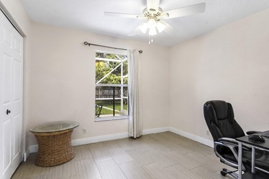 Nestled on a quiet street, this spacious CBS home is designed - photo 15