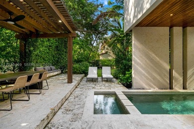 Nestled in the prestigious Ponce-Davis neighborhood, one of - photo 17