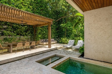 Nestled in the prestigious Ponce-Davis neighborhood, one of - photo 18