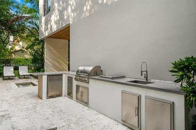 Nestled in the prestigious Ponce-Davis neighborhood, one of - photo 37