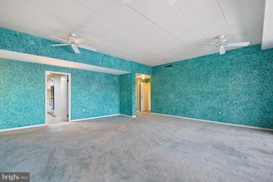 Welcome to Coffee Run. This 5th floor unit boasts higher