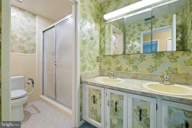 Welcome to Coffee Run. This 5th floor unit boasts higher