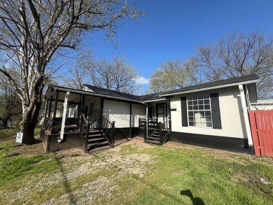 Lake Home For Sale in Denison, Texas