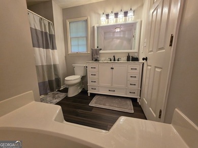 Welcome home to this charming one-level, three-bedroom, two-bath - photo 14