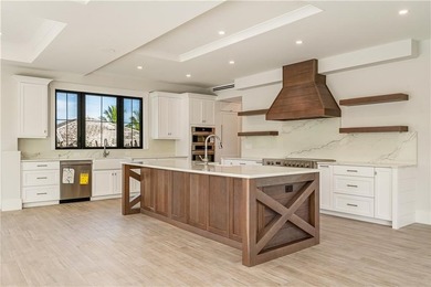 This newly completed coastal retreat offers a rare architectural - photo 9