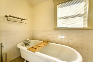 Step back in time with this enchanting 1930 Victorian-style gem - photo 26