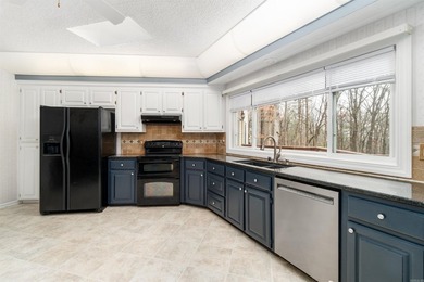 PRICE IMPROVEMENT!! Seasonal views of Lake DeSoto and wooded - photo 18