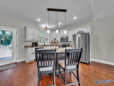 Positioned on the Elk River, this 3-bedroom, 2-bath riverfront - photo 11