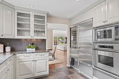 Discover luxurious, low-maintenance living just steps from the - photo 11
