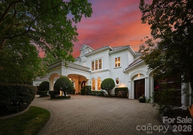 Perched elegantly above Lake Norman's eastern shore and uniquely - photo 2