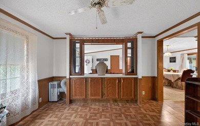 Tucked away in Calverton Meadows, a private setting within a - photo 12