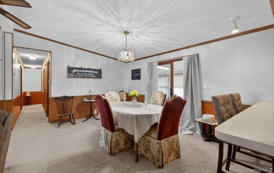 Tucked away in Calverton Meadows, a private setting within a - photo 14