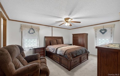 Tucked away in Calverton Meadows, a private setting within a - photo 15