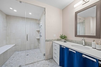 Discover luxurious, low-maintenance living just steps from the - photo 18