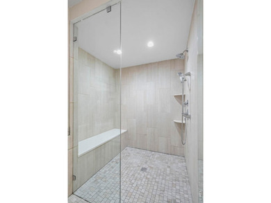 Discover luxurious, low-maintenance living just steps from the - photo 19