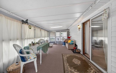 Tucked away in Calverton Meadows, a private setting within a - photo 21