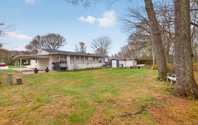 Tucked away in Calverton Meadows, a private setting within a - photo 24