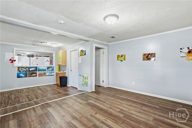 Property set up as a daycare facility. Features classrooms, a - photo 12