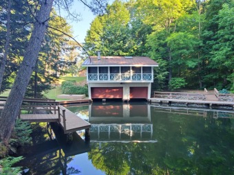 Wet Boathouse on Fence Lake! - Lake Home For Sale in Lac Du Flambeau, Wisconsin