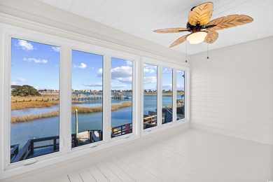 Wake up to sweeping marsh views, glowing sunsets, and the quiet