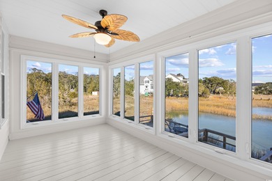 Wake up to sweeping marsh views, glowing sunsets, and the quiet