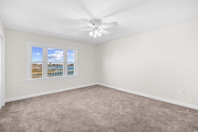 Wake up to sweeping marsh views, glowing sunsets, and the quiet