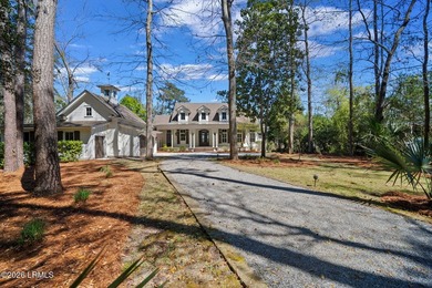 Impeccably maintained home featuring 11' ceilings on the main - photo 3