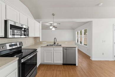 Welcome home to this beautifully maintained 4-bedroom, 2-bath - photo 16