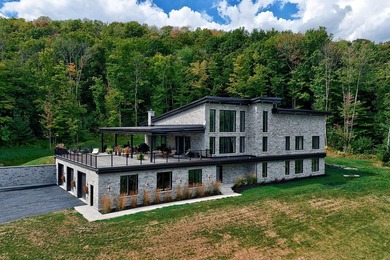(private lake, pond, creek) Home For Sale in Sainte-Catherine-de-Hatley Quebec
