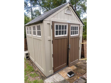 This 2-bedroom, 2-bathroom log cabin offers rustic charm. It is - photo 14