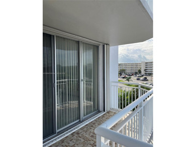 This beautifully maintained 2-bedroom, 2-bath condo offering 1