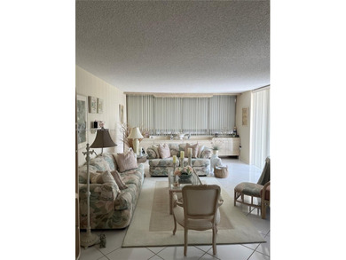 This beautifully maintained 2-bedroom, 2-bath condo offering 1