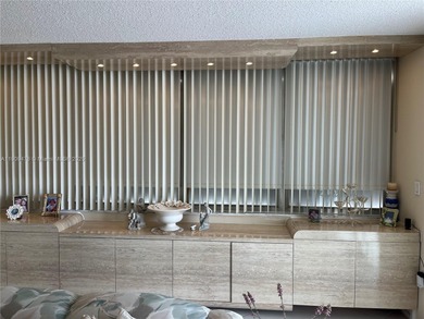 This beautifully maintained 2-bedroom, 2-bath condo offering 1