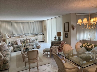 This beautifully maintained 2-bedroom, 2-bath condo offering 1