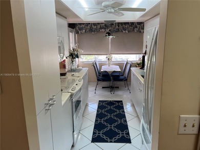 This beautifully maintained 2-bedroom, 2-bath condo offering 1