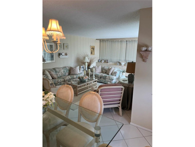 This beautifully maintained 2-bedroom, 2-bath condo offering 1