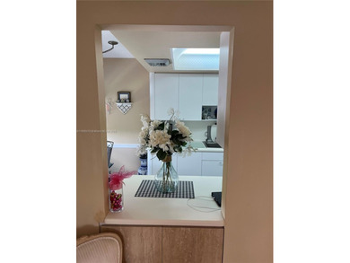 This beautifully maintained 2-bedroom, 2-bath condo offering 1