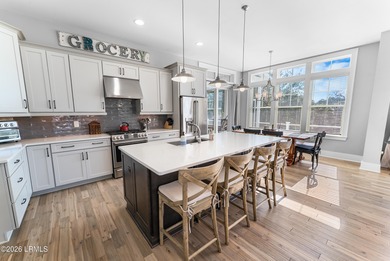 Positioned within the private gates of Shearwater on Hilton Head