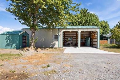 MLS# 294795 Two shops, a barn, an established mini orchard - photo 7