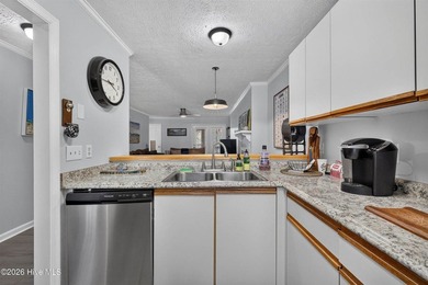 Welcome to 1823 Savannah Court, Unit B3, a well-maintained - photo 6