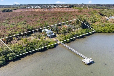 A rare riverfront sanctuary spanning 5 acres with approximately - photo 3