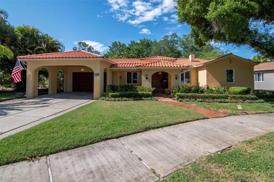 Don't miss this exceptional Mediterranean Revival set on an - photo 1