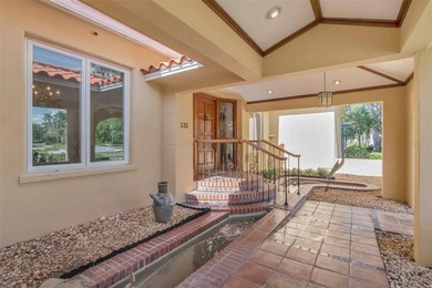 Don't miss this exceptional Mediterranean Revival set on an - photo 3