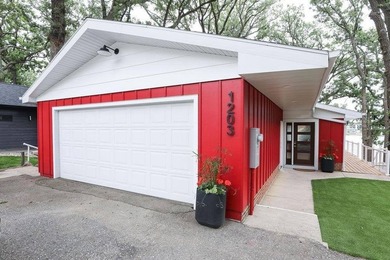 For over 50 years, the iconic red house on Smith's Bay has been - photo 2
